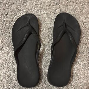 Archie’s Black Flip Flops Size 8.
